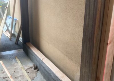AVO Rénovation - isolation d un garage aux Ponts de cé - maçonnerie surbots - menuiserie porte fenêtre bardage