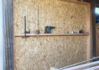 AVO Rénovation - isolation d un garage aux Ponts de cé - maçonnerie surbots - menuiserie porte fenêtre bardage
